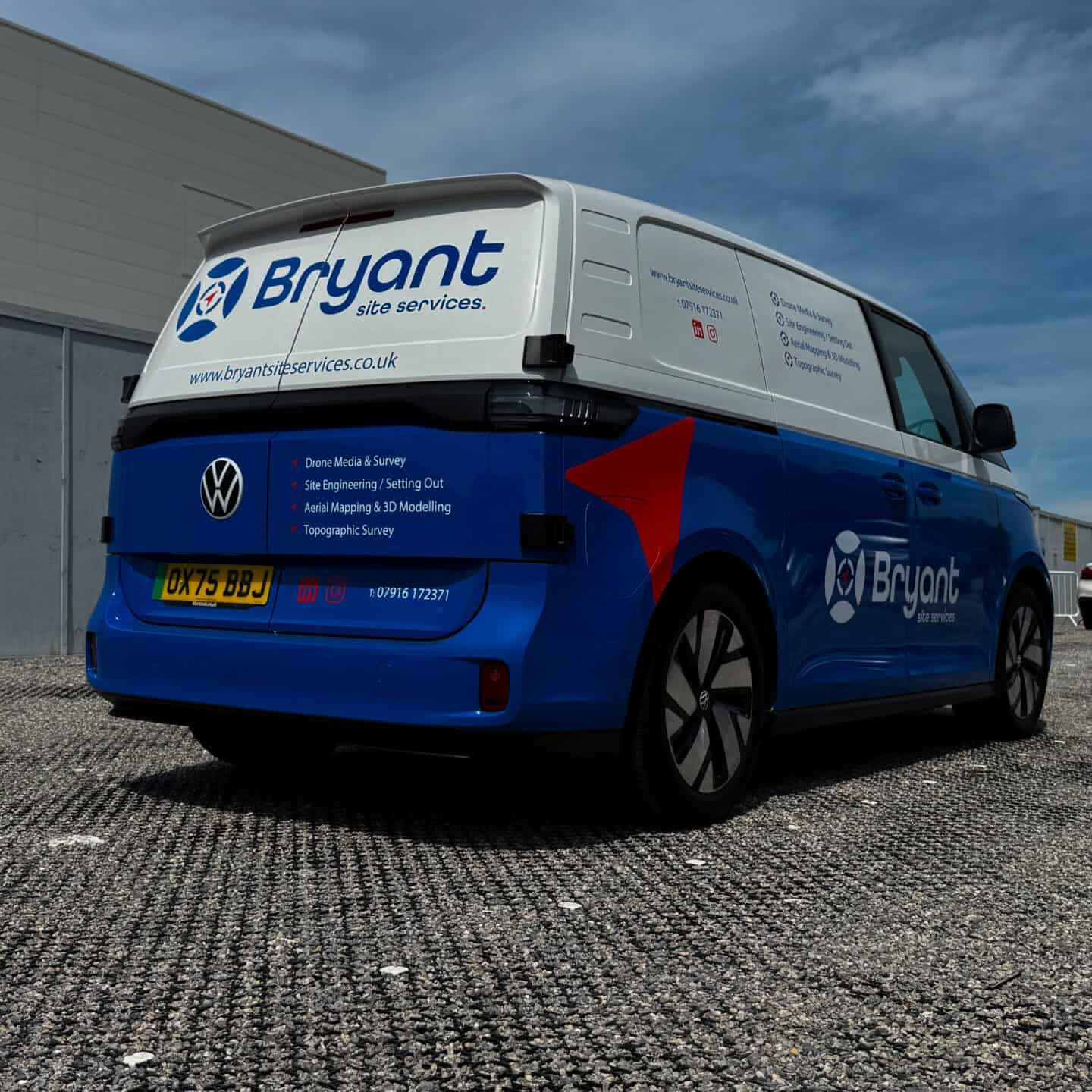 Company van for Bryant Site Services with branding and contact info.