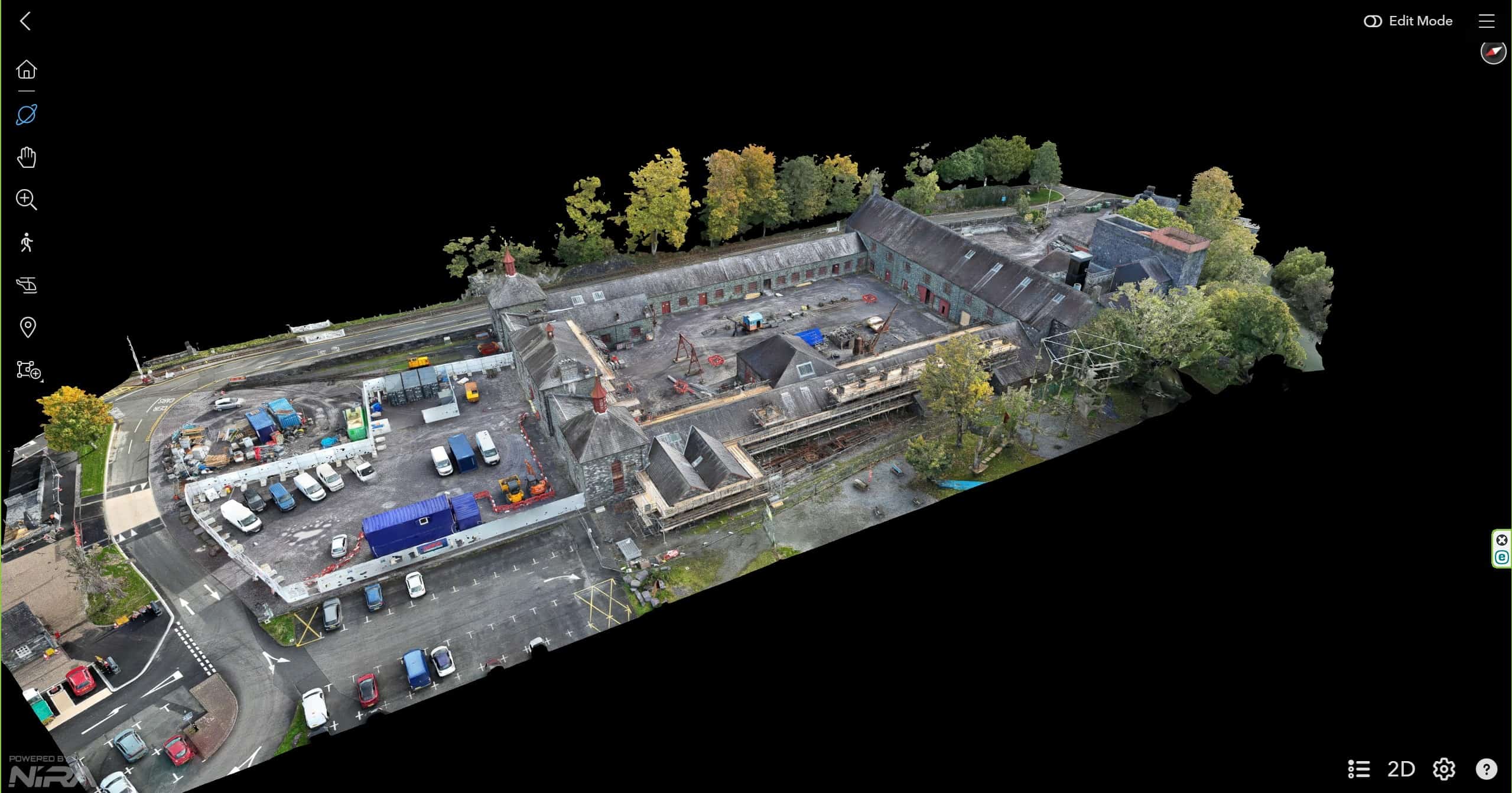 Aerial view of Bryant Site Services construction site with equipment and buildings.